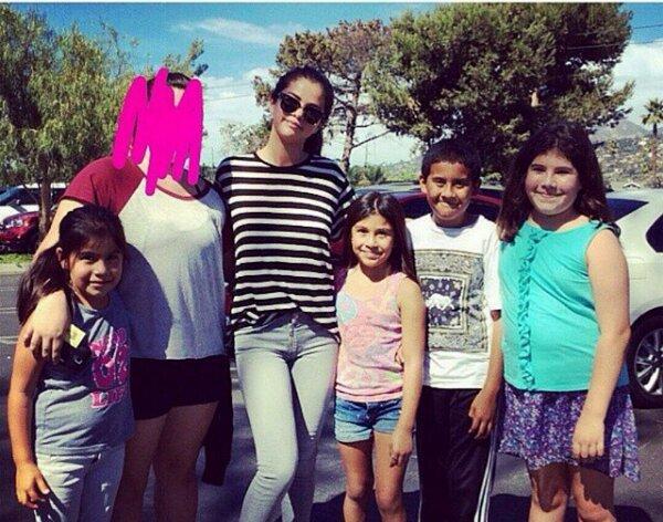 Selena with fans in zoo