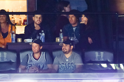 Selena with dad at basketball game