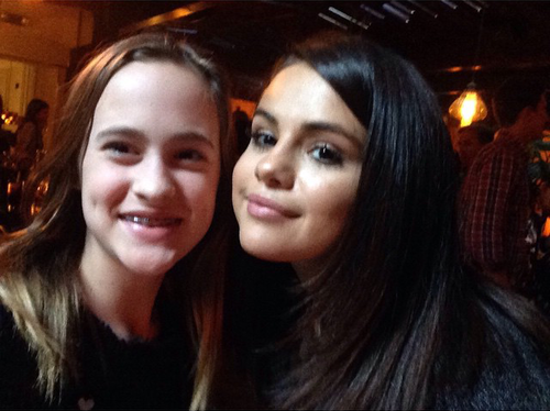 Selena with a fan