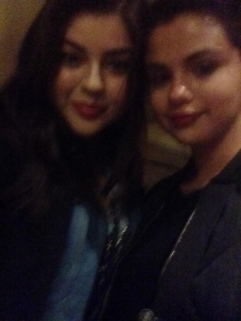 Selena with a fan at Disneyland