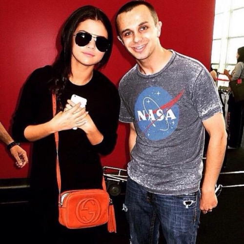 Selena with a fan at New York's airport