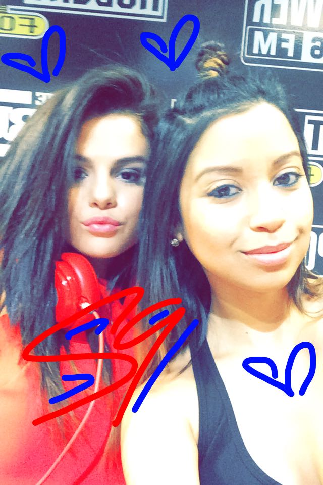 Selena with Power 106's DJ