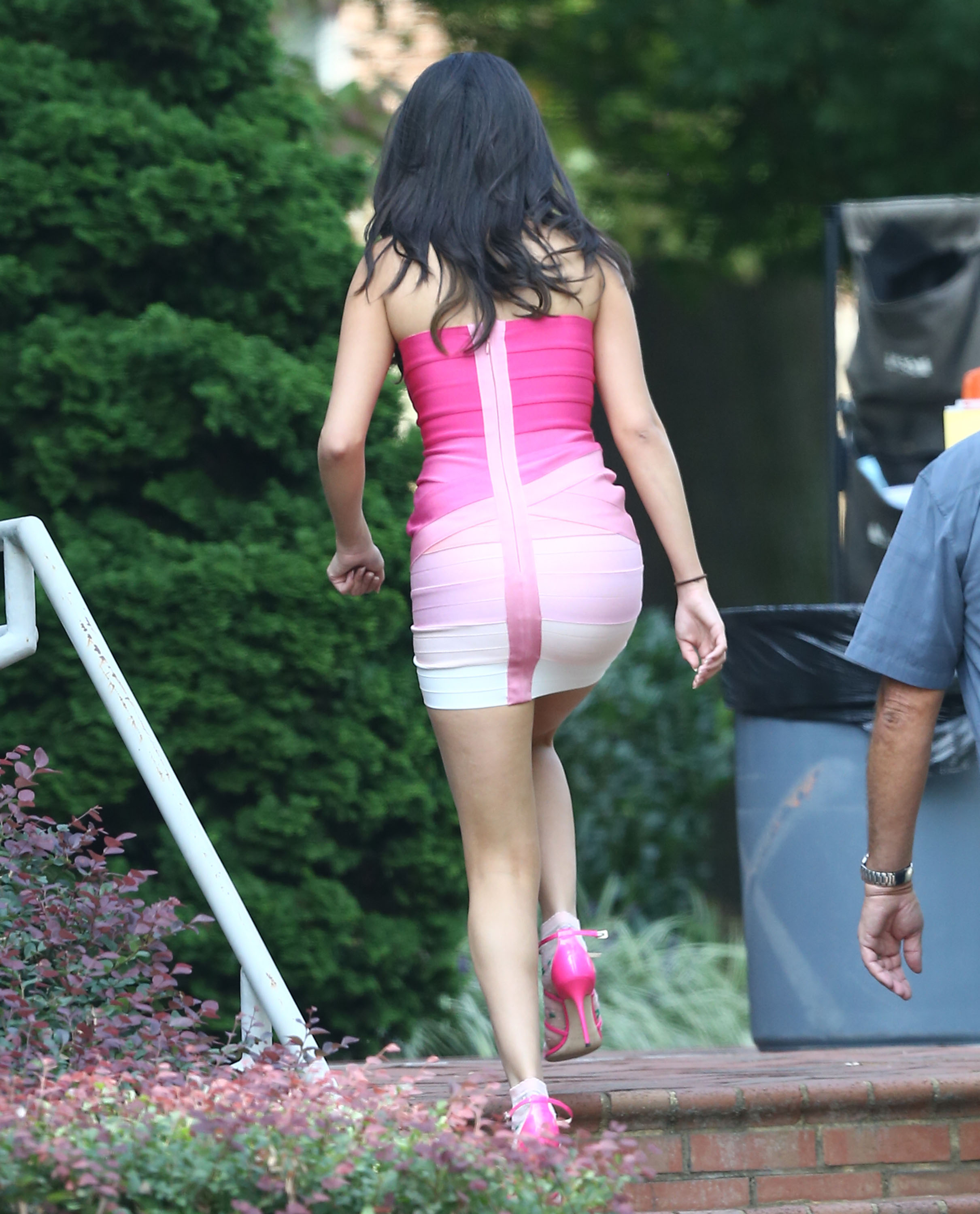 51840326 Actress Selena Gomez wears a tight pink dress on the set of &q...