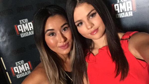 Selena with AMP Radio DJ