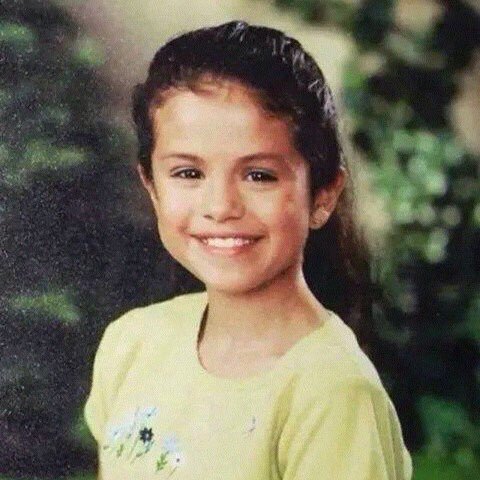 New fetus pic of Selena from set of Barney & Friends