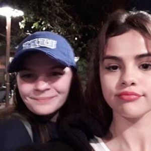 Selena with a fan at Disneyland