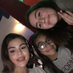 More pics of Selena with fans at Moonlight Rollerway in CA