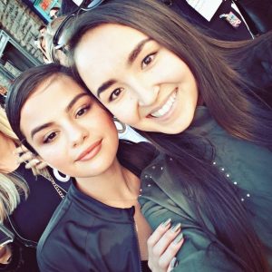 New pic of Selena with a fan at Puma DEFY City