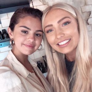 24 June Selena with a fan in Los Angeles