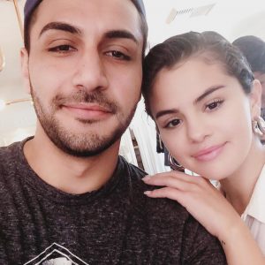 24 June Selena with a fan at Newport Beach, California