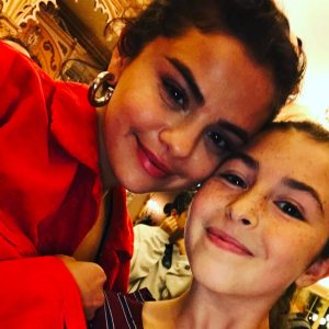 4 July Selena with a fan at Disneyland