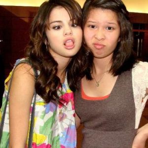 24 January new rare pics of Selena with fans at the Radio Disney in April 2009