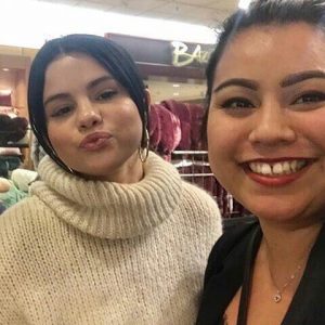 31 December Selena with fans at the store in Los Angeles