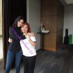 30 May Selena with a fan this March