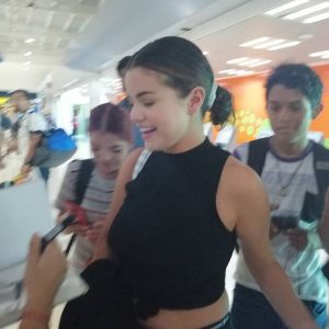 30 June Selena with fans at the airport in Puerto Vallarta, Mexico