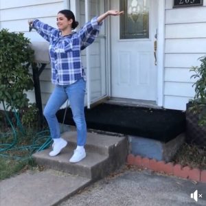 9 September Selena stading at her old home in Texas