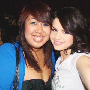 12 October new pics of Selena with a fan backstage in 2010