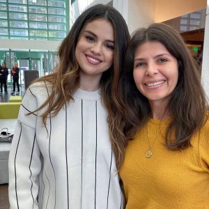 22 October Selena with a fan at Interscope in Los Angeles, California