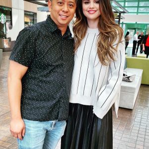 23 October Selena with a fan in Los Angeles