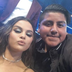 24 November new pics of Selena with fans at American Music Awards in Los Angeles