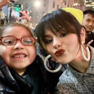 14 January new pic of Selena with a fan at the Puma Flashgrip Store in New York