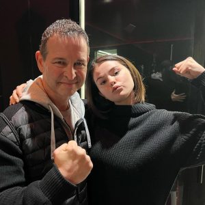 14 November: Selena posing with her boxing trainer!