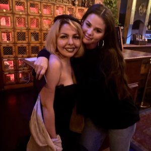 24 June: Selena with a fan at the restaurant in Los Angeles