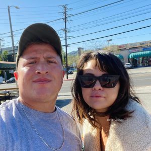 Selena with a fan late June in Los Angeles