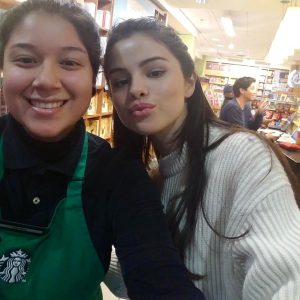 8 July: another rare pic of Selena with a fan from a few years ago