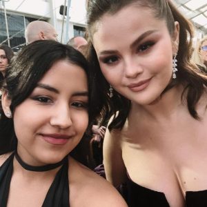 10 January: Selena with a fan after attending the Golden Globe Awards