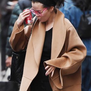8 April: Selena rocks pink sunglasses while out and about in New York