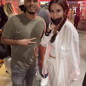 14 September: Selena with a fan at the airport JFK in New York