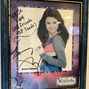 11 April: signed by Selena poster hanging at one of the restaurants in TX