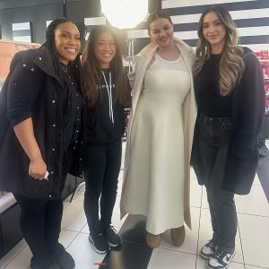 31 July: new rare pic of Selena with fans at Sephora from last March