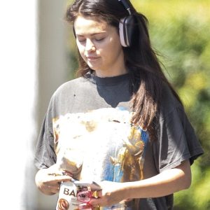 29 August: Selena spotted blasting her Apple AirPods Max in Burbank, California