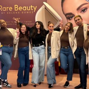 6 August: Selena poses with Rare Beauty team backstage at Sephora SMC