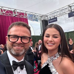 18 September: another new picture of Selena with a fan at the Emmy Awards