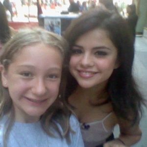 21 July: new rare pic of teen Selena with a fan in 2010