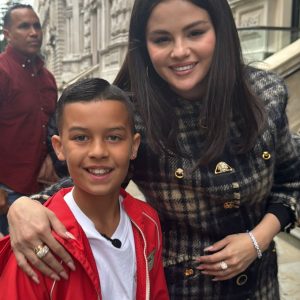 3 December: new rare pic of Selena with little fan boy