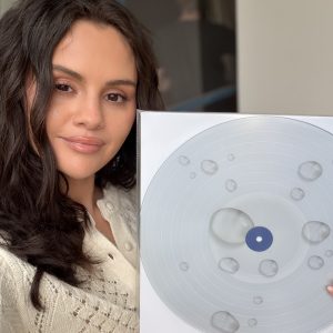 17 April: new pics of Selena posing with her Droplets EP vinyl