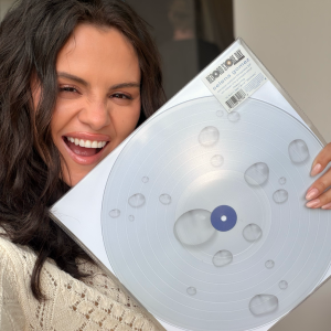 16 April: new pic of Selena posing with her Droplets EP vinyl